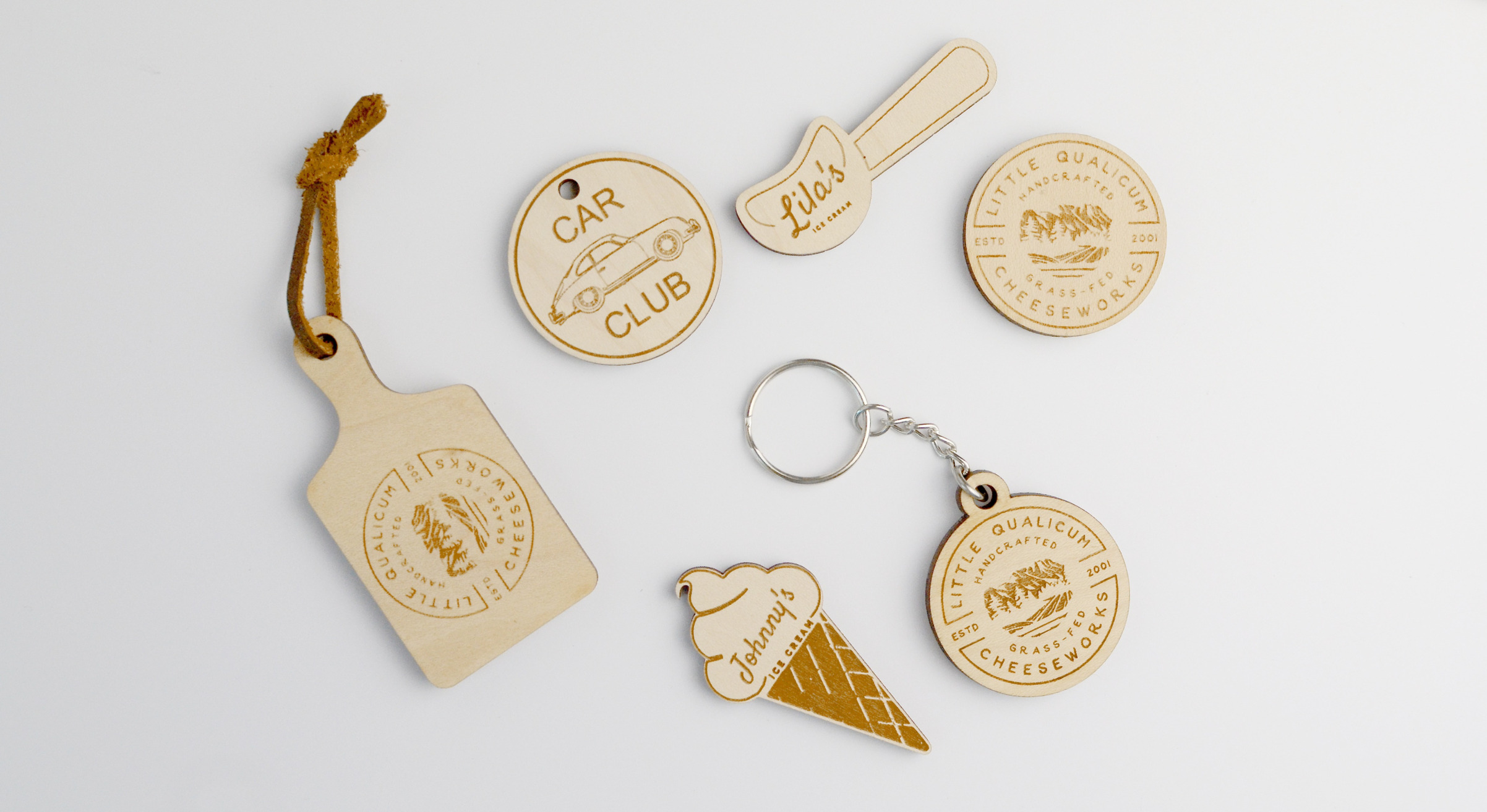 laser cut & engraved keychains and magnets in various shapes and sizes